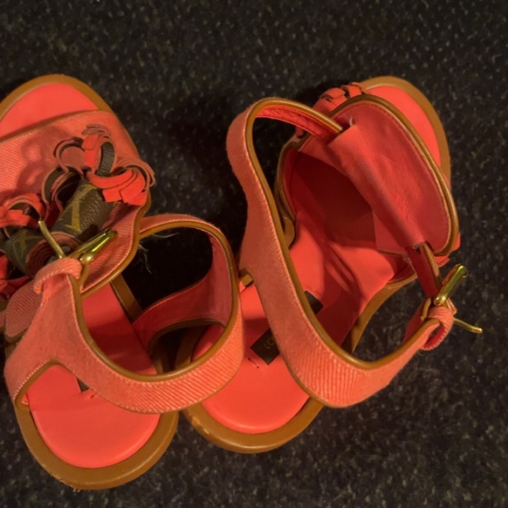 Louis Vuitton wedge heels . 38.5 ( I am a true 7.5 some 8) and it fits me well